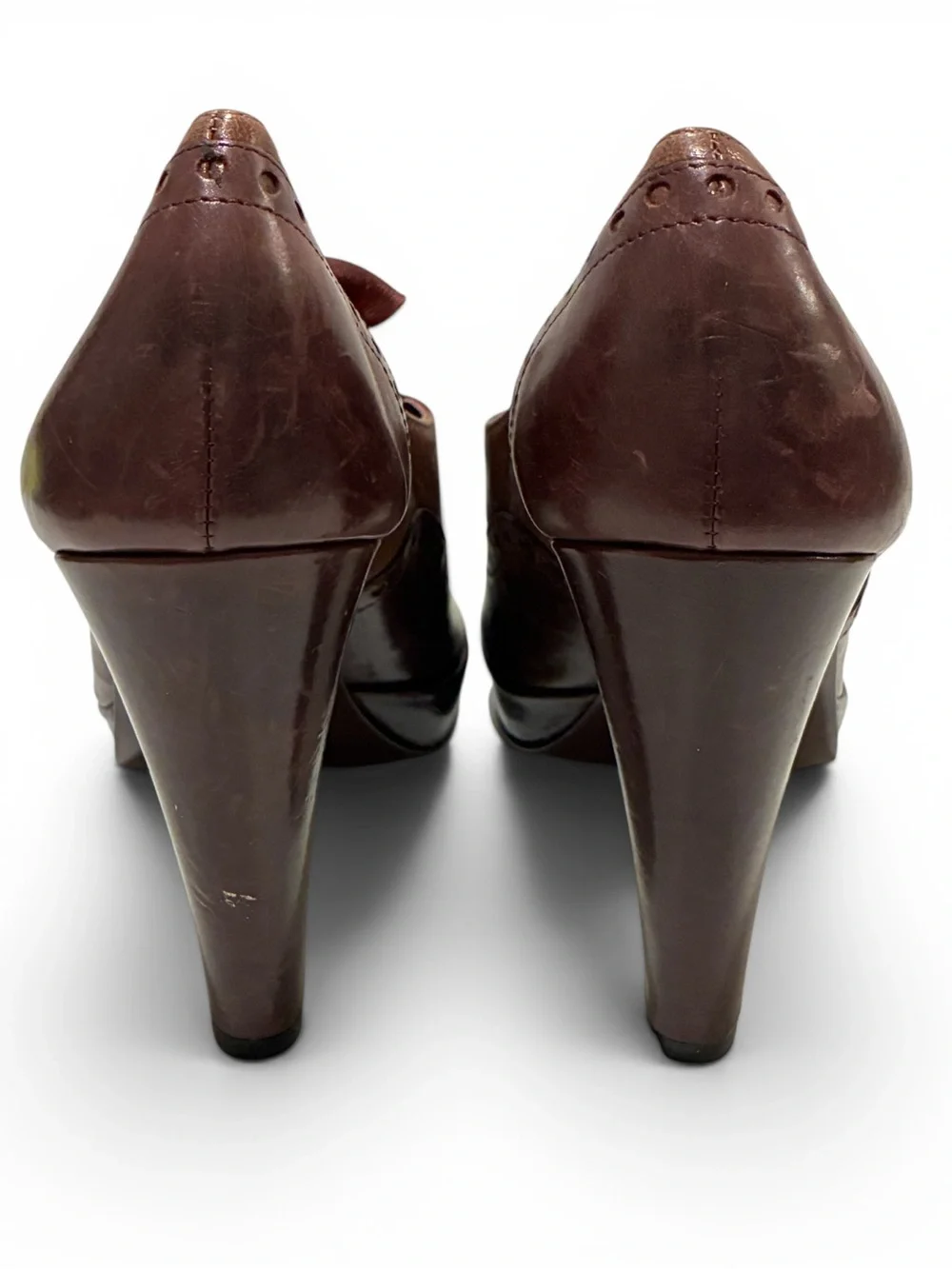 Vintage Coach Claudine leather peep toe lace front spectator heels. 7.5